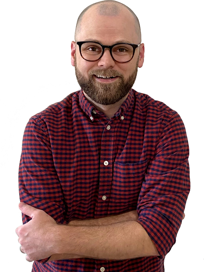 Matt Leahy, caucasian male with dark, round glasses, a shaved head, and a short brown beard
